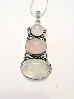 2 1/2 inch, 3 Rose Quartz, 925 marked pendant on a silver chain.